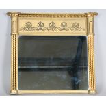 A 19th century giltwood and gesso overmantel mirror with a ball shot pediment and palmette moulded