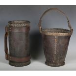 An early 20th century brown leather and copper mounted fire bucket, height 28cm, together with a