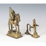 A 19th century Indian brass figure group of Shiva and Parvati on horseback, height 19cm, together