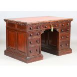 A fine Edwardian mahogany twin pedestal desk, probably by Gillows of Lancaster, the top and two side