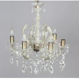 An early/mid-20th century glass six-branch chandelier, the swan neck branches united by chains and