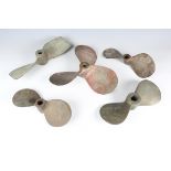 A group of five brass boat propellers, largest width 36cm.Buyer’s Premium 29.4% (including VAT @