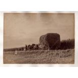 PHOTOGRAPHS. A mounted photograph of a haycart by Frank Meadow Sutcliffe, 15cm x 20.5cm, together