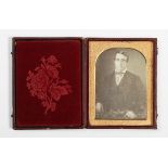 PHOTOGRAPHS. Two cased daguerreotypes of gentlemen, 9.3cm x 11.7cm, together with ten ambrotypes,