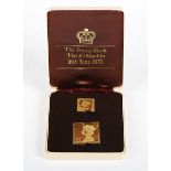A 22ct gold stamp replica of a 1d black and £1 Machin, produced by Hallmark in a limited edition