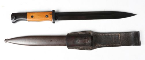 A German K98 bayonet with single-edged fullered blade, blade length 25cm, the ricasso marked 'J. Sch