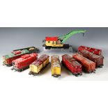 A collection of Lionel tinplate gauge O goods rolling stock, including No. 815 tanker, hopper