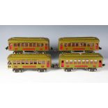 Three Ives Trains gauge O Pullman coaches and an observation coach with veranda, green livery, and