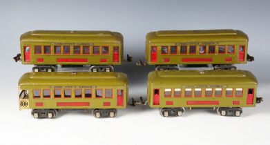 Three Ives Trains gauge O Pullman coaches and an observation coach with veranda, green livery, and