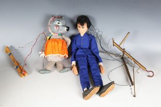 A Pelham Puppets Mother Bear, boxed, and a scratch-built puppet of a member of The Beatles.Buyer’s