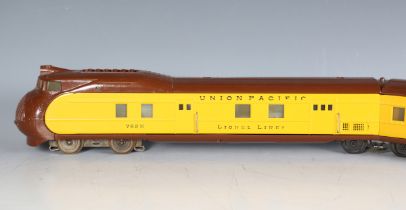 A Lionel gauge O 3-rail No. 752E City of Portland three car streamliner train, brown and yellow