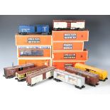 A good collection of Lionel gauge O plastic-bodied stock cars, various liveries, some boxed (some