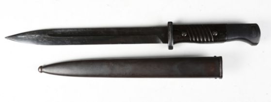 A German K98 bayonet with single-edged fullered blade, blade length 25cm, the ricasso marked 'BYM No