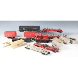 A good collection of Lionel gauge O plastic goods wagons, including car and boat loaders, trailer