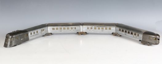 A Lionel gauge O electric 3-rail Flying Yankee diesel train, the motor coach with metallic grey