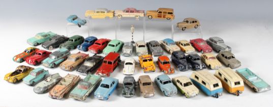 A collection of Dinky Toys cars and caravans, including No. 162 Ford Zephyr, No. 166 Sunbeam Rapier,