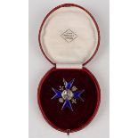 A Florence Nightingale School of Nursing blue enamelled badge, detailed 'Nightingale School St