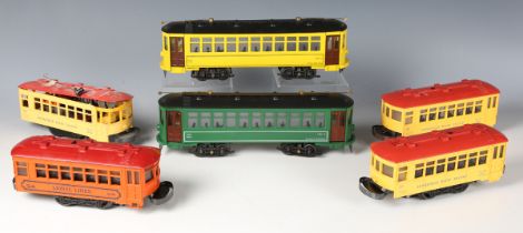 A Lionel gauge O electric 3-rail plastic-bodied No. 60 trolley bus, boxed, three similar trolley