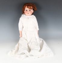 An Armand Marseille bisque head and shoulders doll, impressed '370 AM 8 DEP', with later brown