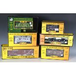 Six items of Rail King by MTH gauge O goods rolling stock, comprising No. 30-77140 steel caboose