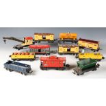 A small collection of Lionel gauge O tinplate goods rolling stock, including tanker 'Shell', two