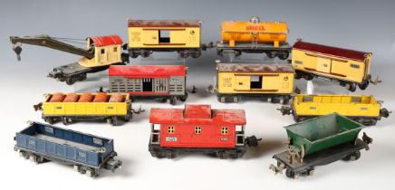 A small collection of Lionel gauge O tinplate goods rolling stock, including tanker 'Shell', two