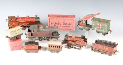 A small collection of gauge O railway items, including Bing for Bassett-Lowke clockwork