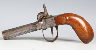 An early 19th century double-barrelled percussion pistol, barrel length 7cm, with engraved foliate