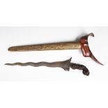 An early 20th century Indonesian kris dagger with wavy double-edged blade, blade length 33cm, and