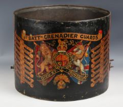 An early 20th century brass military drum body, the side painted with the Royal arms and military