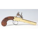 A late 18th/early 19th century flintlock pistol with brass turn-off barrel, barrel length 8cm, brass