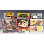 A collection of diecast cars and commercial vehicles, including Corgi trams, buses, coaches and