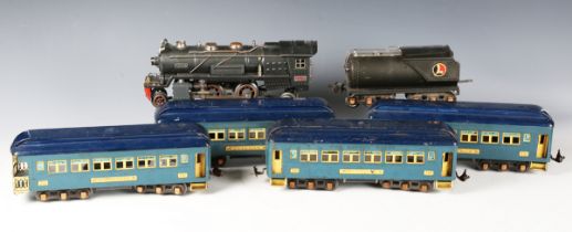A Lionel gauge O 3-rail No. 260-E electric steam locomotive and tender, together with three