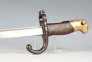 A French Gras bayonet with single-edged fullered blade, blade length 52cm, dated '1879', hooked
