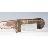 A 19th century Indo-Persian pesh-kabz with shaped deep-fullered blade, blade length 31cm, brass