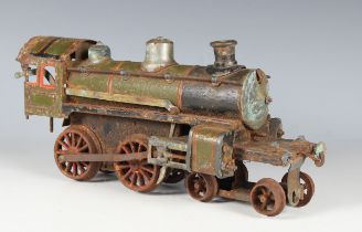 A gauge O clockwork 4-4-0 locomotive, possibly German, in green and black red-lined livery (rust,