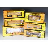Six items of Rail King by MTH gauge O goods rolling stock, comprising No. 30-7005c modern reefer,