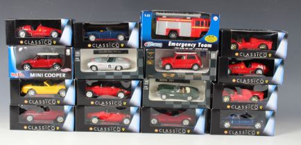 Twelve Shell Collezione Classico Ferrari model cars and six other model cars, all within window