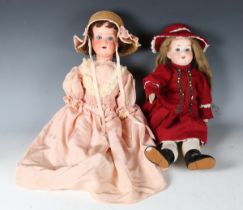An Armand Marseille bisque socket head doll, impressed '390 A1½M', with later wig, sleeping blue