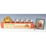 A Lesney Coronation Coach and a Timpo Queen Elizabeth II on horseback, both boxed (boxes creased and
