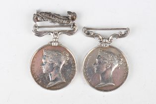 An unattributable unnamed group of four medals, probably as awarded to a Royal Navy recipient,