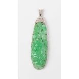 A jade and diamond drop shaped pendant, 1920s/30s, the jade carved and pierced in a floral and