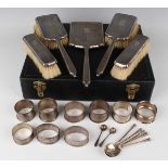 A George VI silver mounted five-piece dressing table set with engine turned decoration, comprising