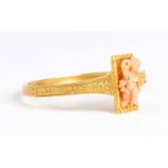 An Austro-Hungarian gold and coral oval hinged bangle, second half of the 19th century, in the