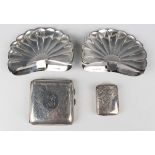 A George V silver curved rectangular cigarette case engraved with scrolls, Chester 1919, length 8.