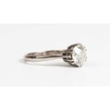 A white gold, platinum and diamond solitaire ring, claw set with the transitional cut diamond,