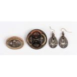 A group of Victorian tortoiseshell and piqué jewellery, comprising a circular brooch, diameter 3.