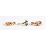 A gold, green tourmaline and half-pearl ring, claw set with a circular cut green tourmaline within a