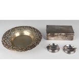 A Continental .800 silver circular bowl with pierced and engraved outswept rim, raised on ball feet,