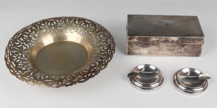 A Continental .800 silver circular bowl with pierced and engraved outswept rim, raised on ball feet,